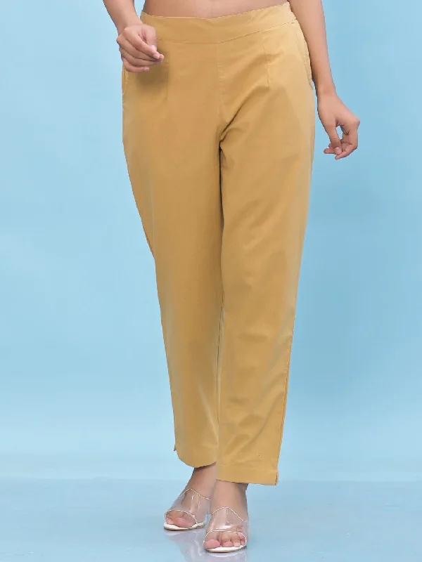 Women Gold Solid Cotton Pants With Partially Elasticated Waistband And Two Side Pockets Modern Stretch Trousers Women Gold Solid Cotton Pants With Partially Elasticated Waistband And Two Side Pockets Modern Stretch Trousers